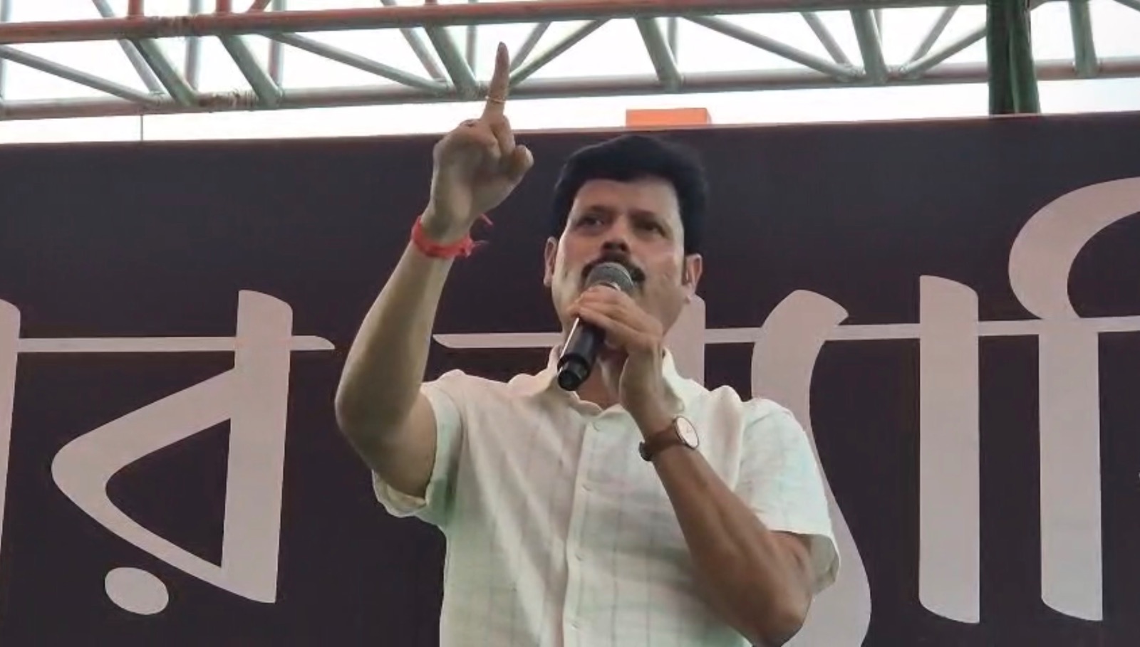 Tripura BJP General Secretary Bhagaban Das addressing the gathering during the protest rally in Agartala on October 26.